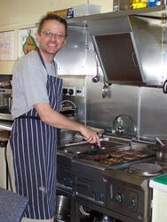 Trevor flipping burgers.JPG
